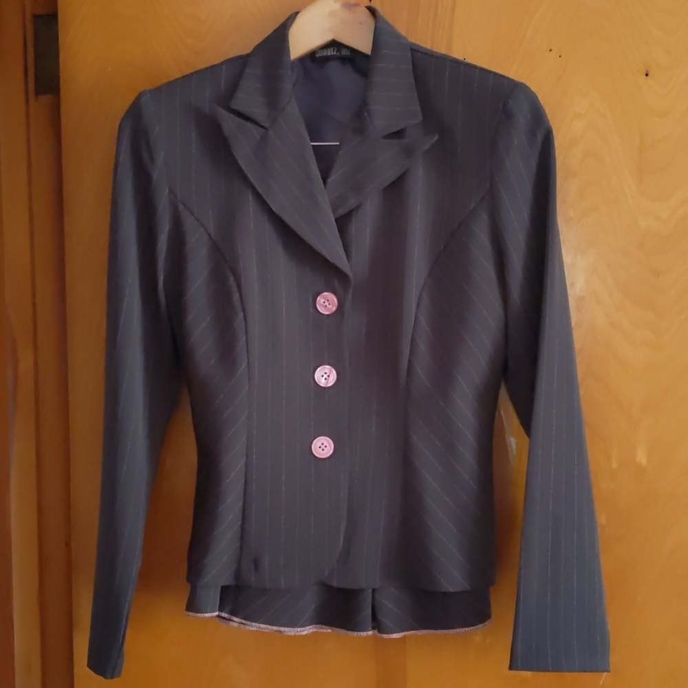 Brand new super cute 2 piece skirt suit. NWT